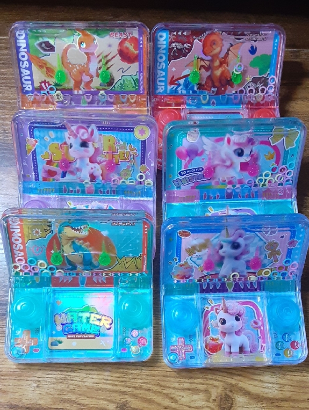 Pick 1 Handheld Water Games Water Ring Toy